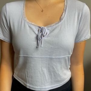 Pacsun “Me to We” blue crop top